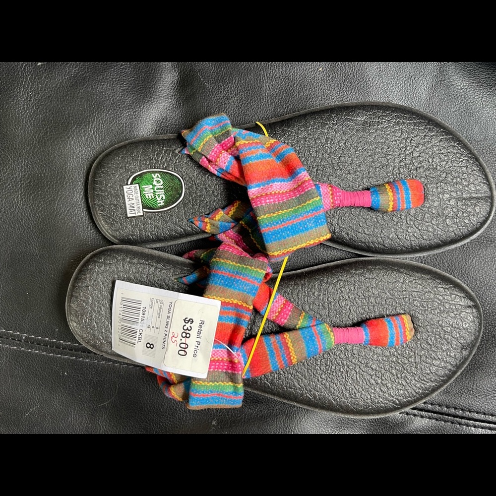 Sanuk. New with tags. Size 8